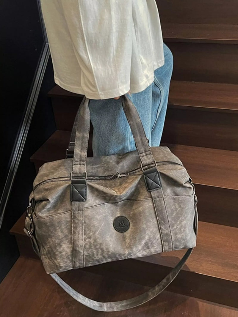 Dark gray vintage washed leather duffel front view