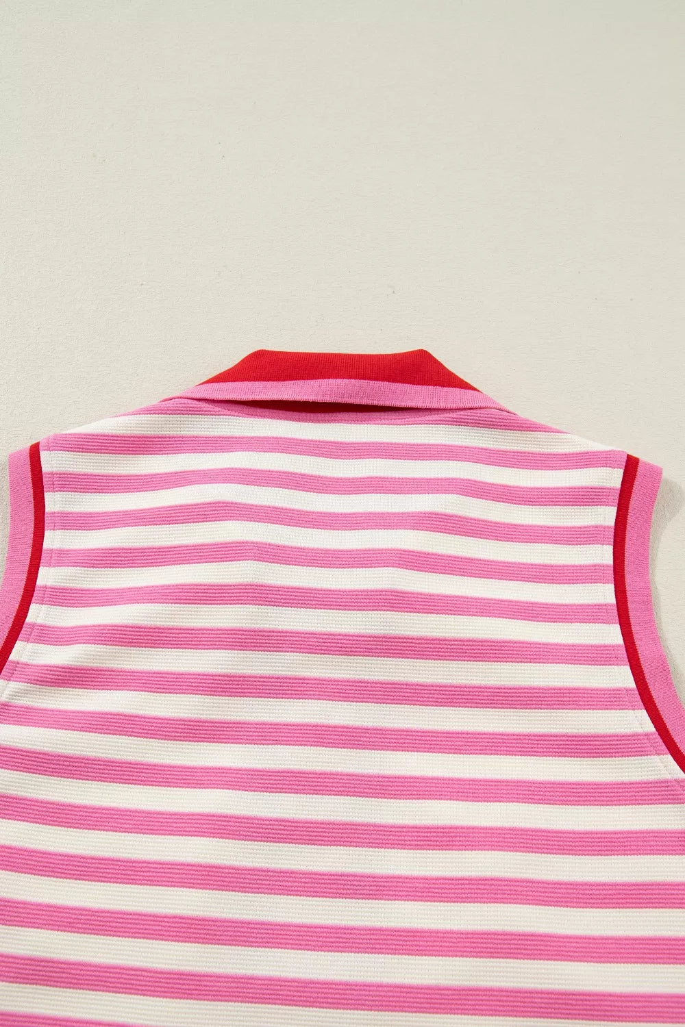 Striped sleeveless top zipper close up
