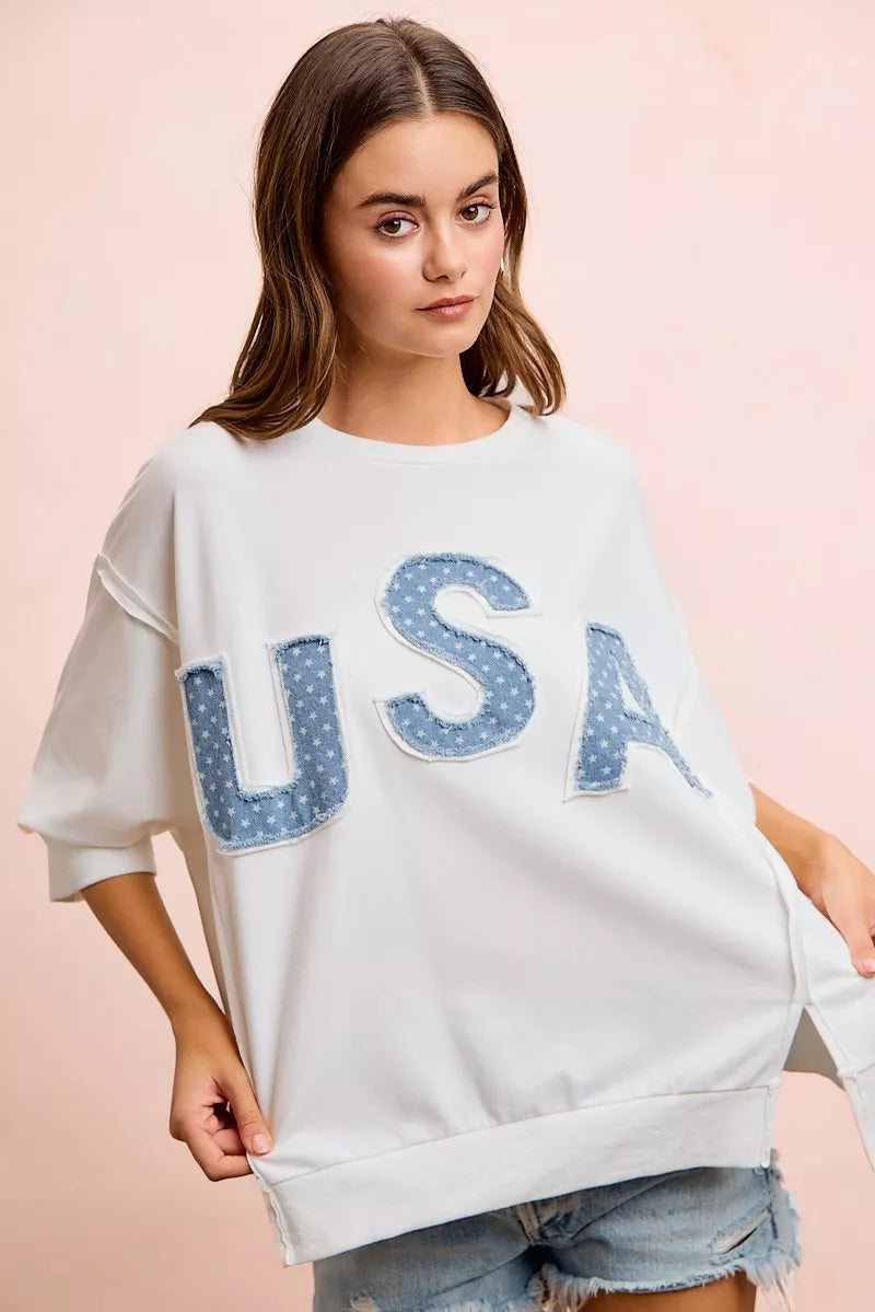 Ivory BiBi USA letter patchwork French terry top close up detail