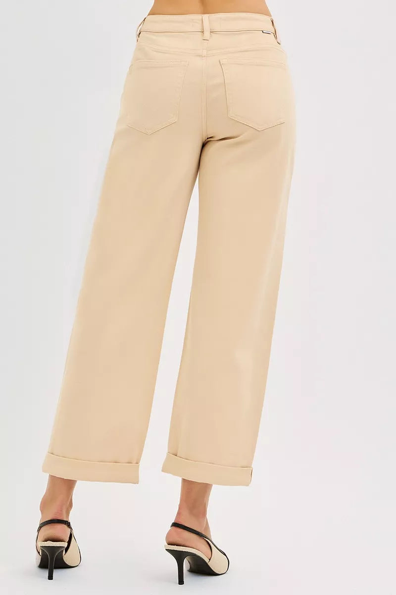 Full length styling of cream barrel jeans
