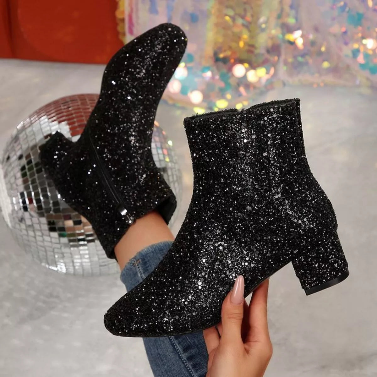 black sequin block heel boots upper close up