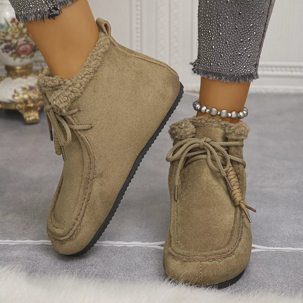 Plush lined ankle boots, pair placed together