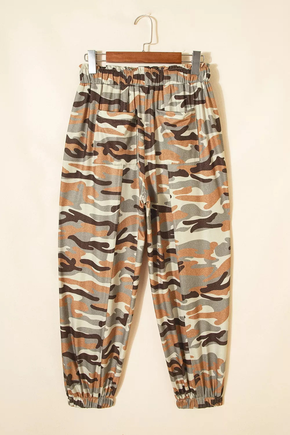 Close up of camouflage print fabric in taupe