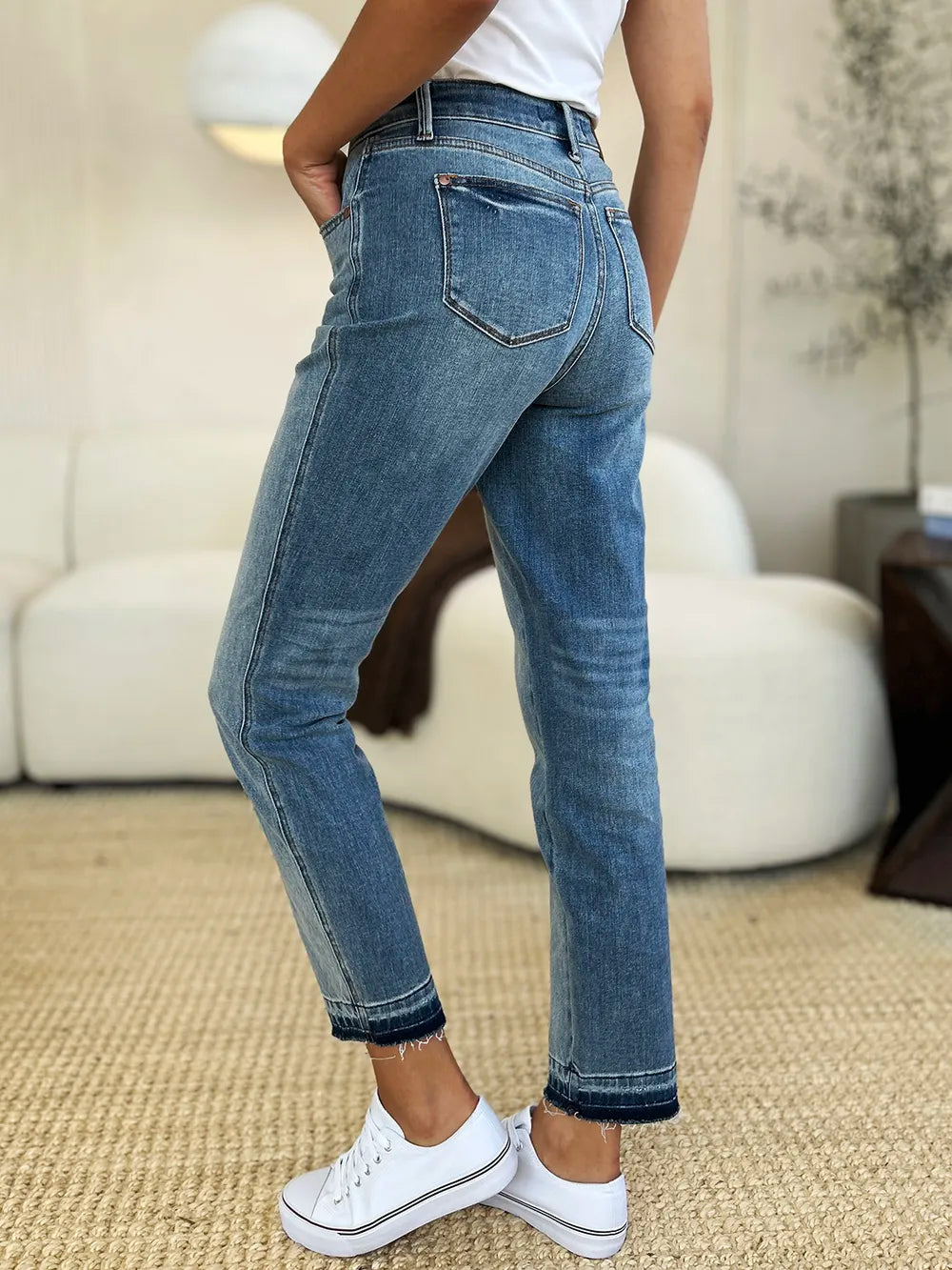 Mid rise jeans styled on model