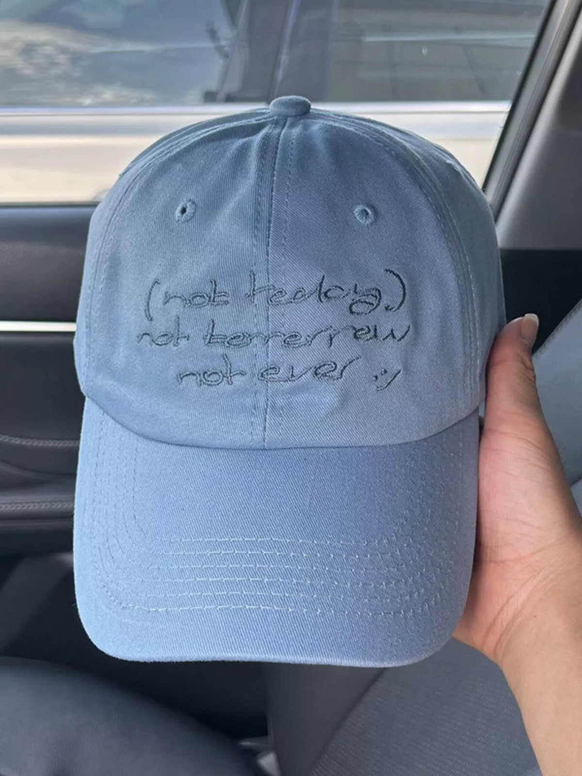 Light blue embroidered baseball cap side view