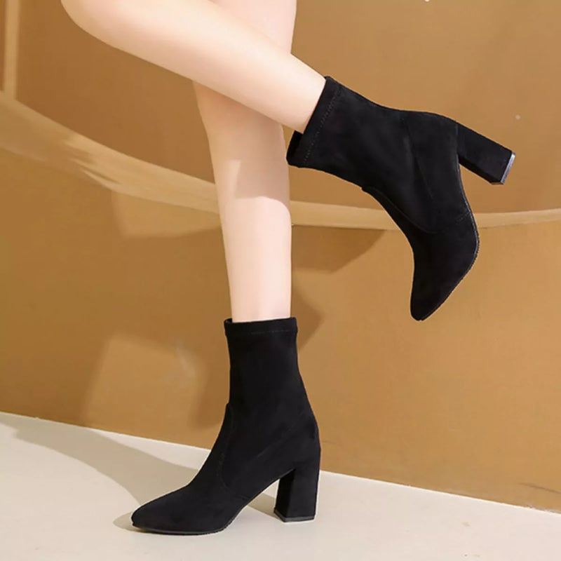 Suede pointed toe block heel boots front view