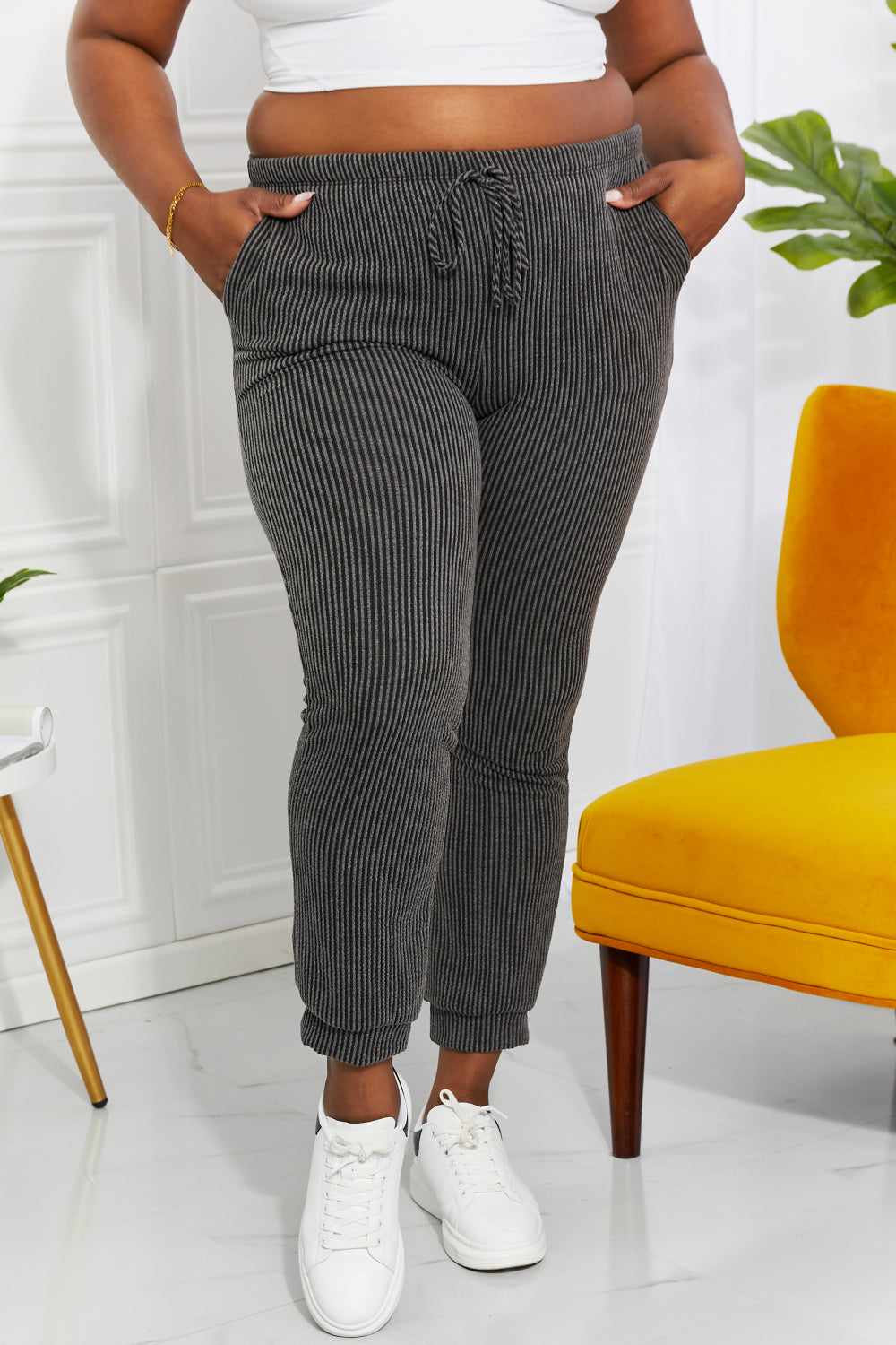 On model styling of cropped joggers with a fitted tee