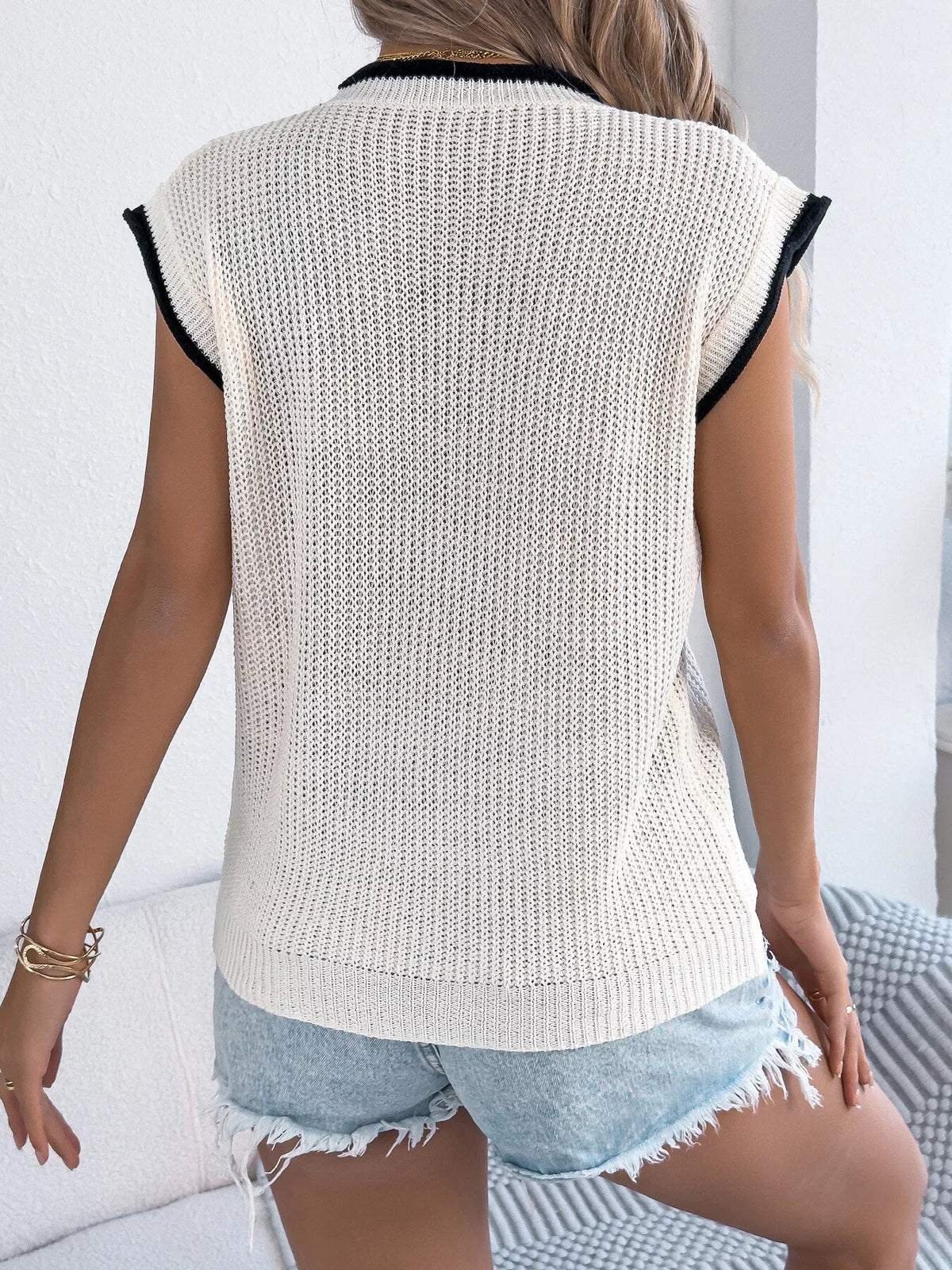 Round neck cap sleeve sweater side view