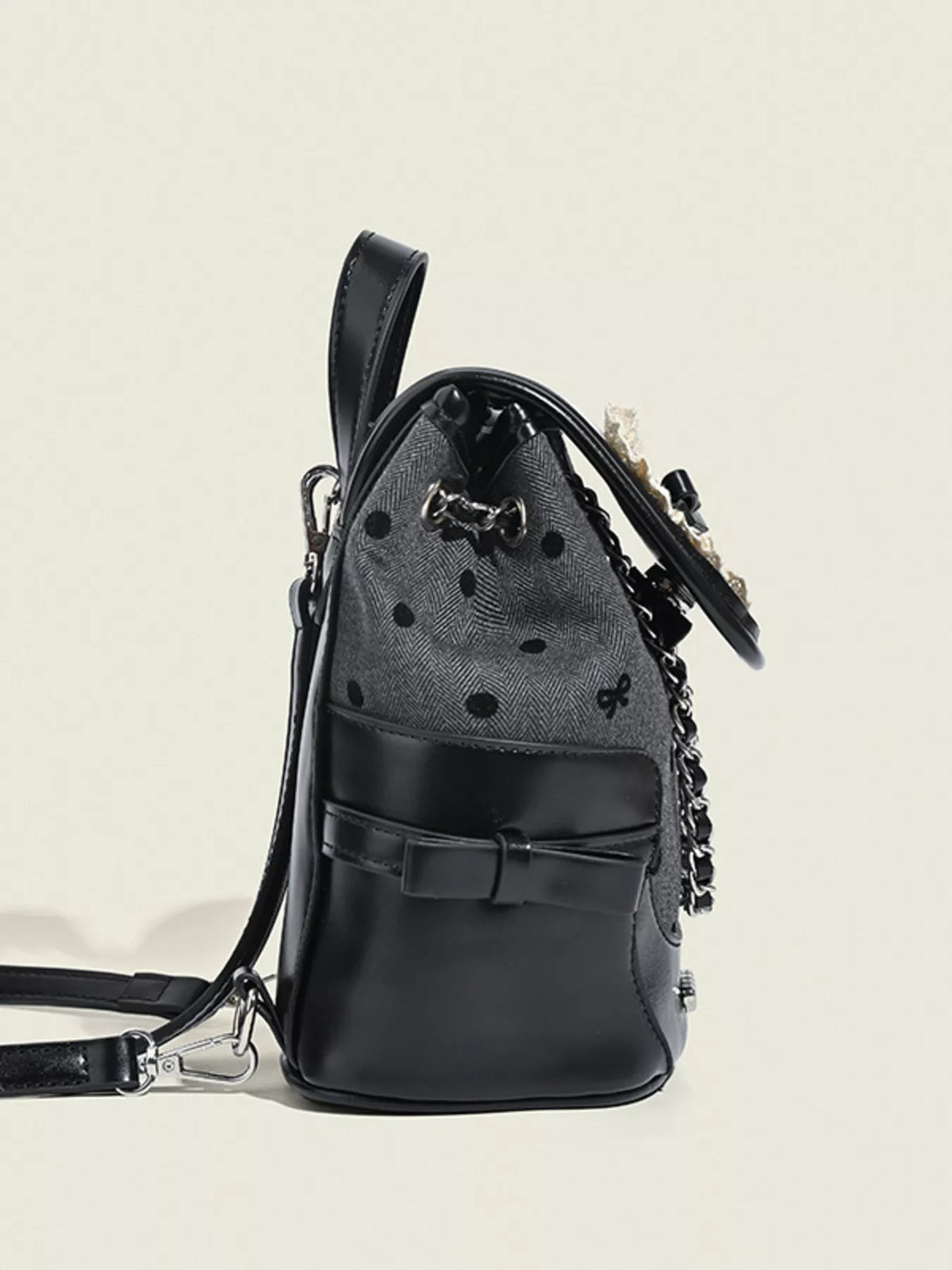 Black backpack showing heart accents