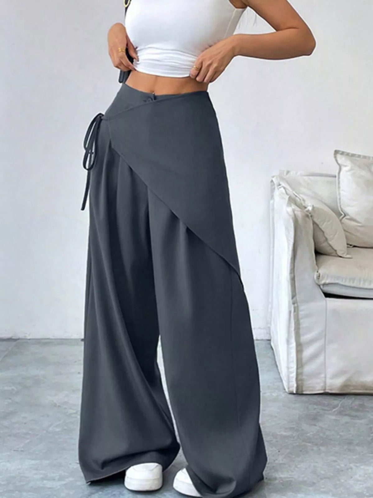 Wide leg pants styled with a fitted tucked tee