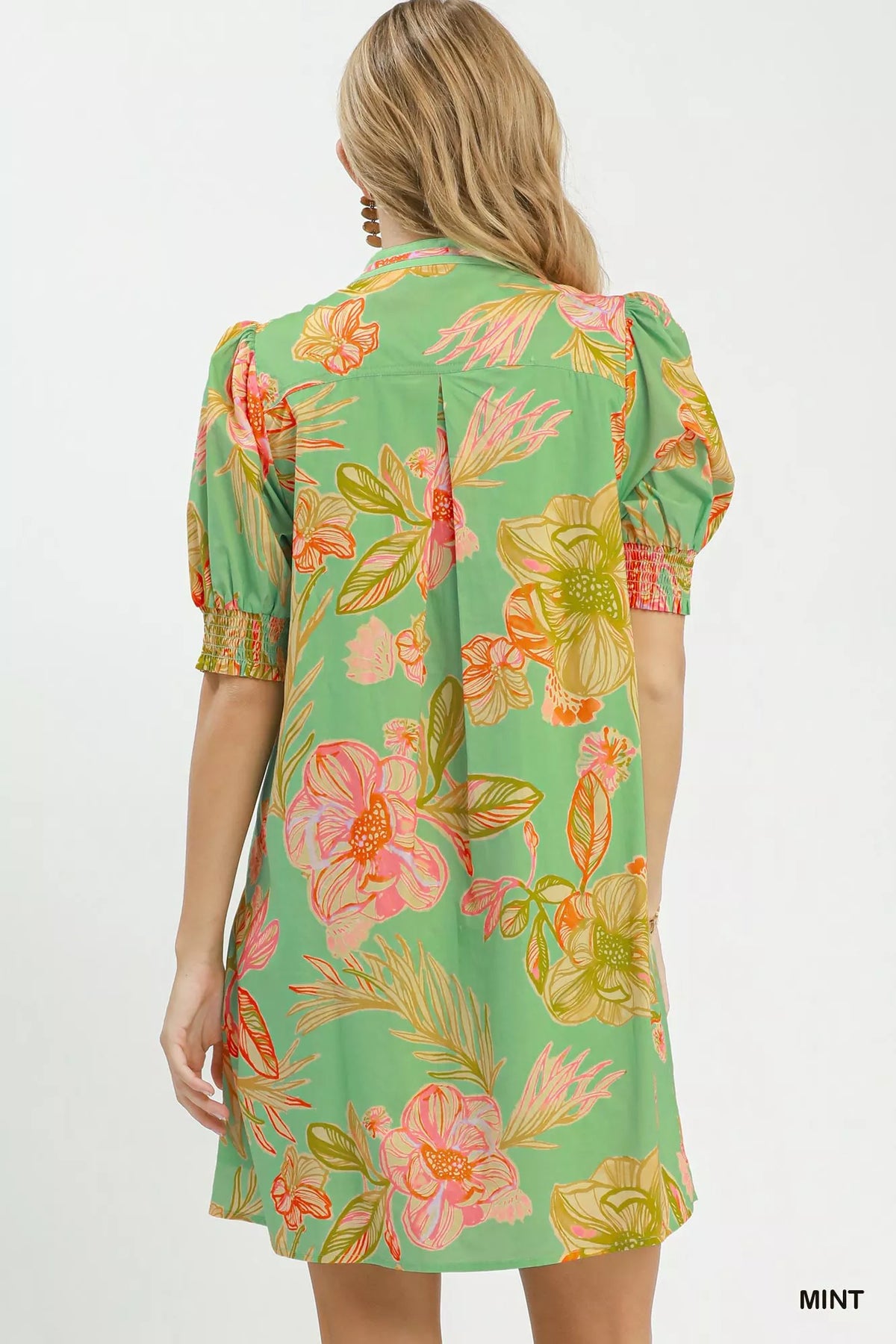 Mint botanical print boho dress with smocked cuffs front view