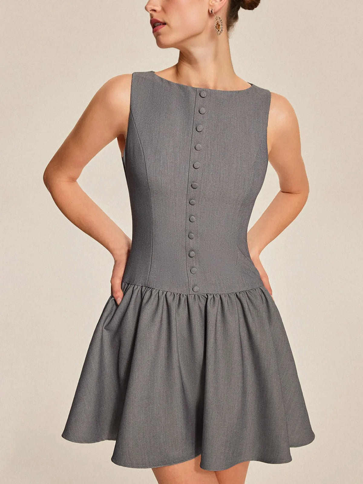 Round neck sleeveless ruffled mini dress styled detail