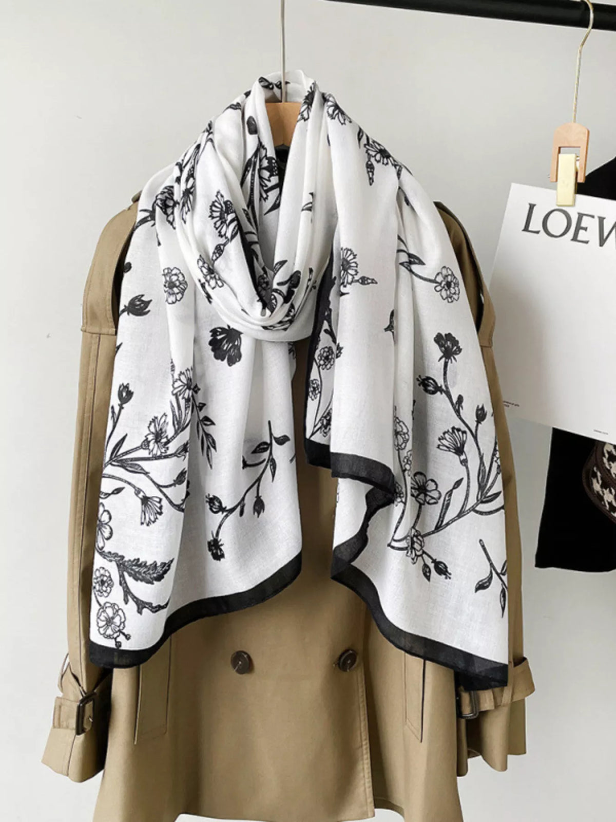Close up of the floral print pattern on the scarf