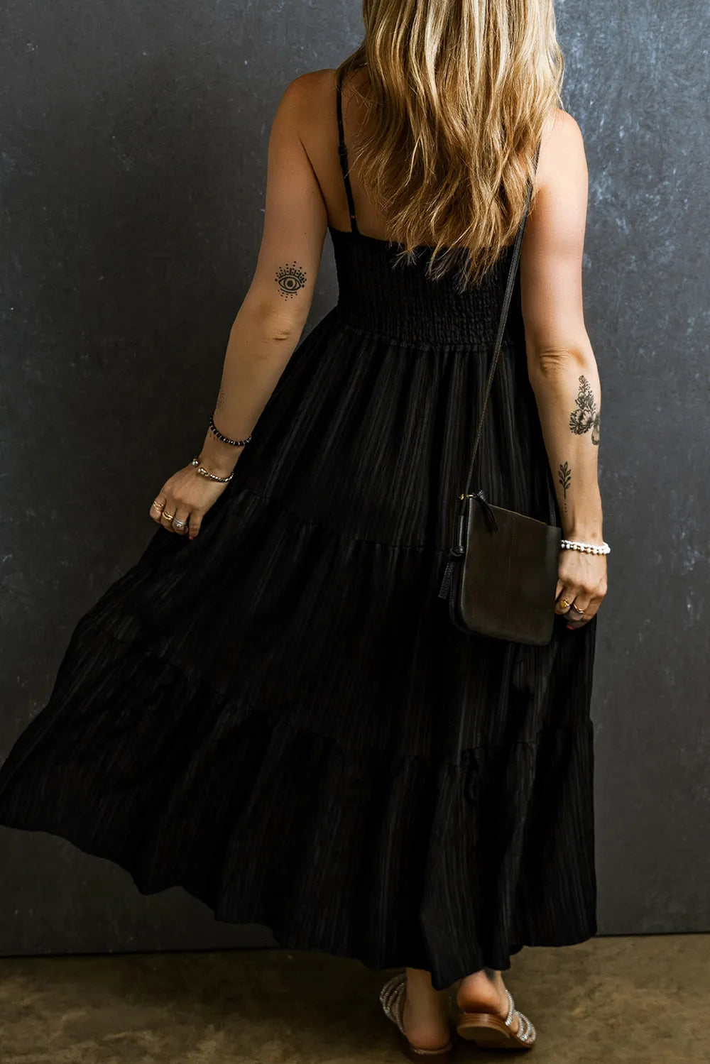 Black smocked tiered spaghetti strap maxi dress, full length styling