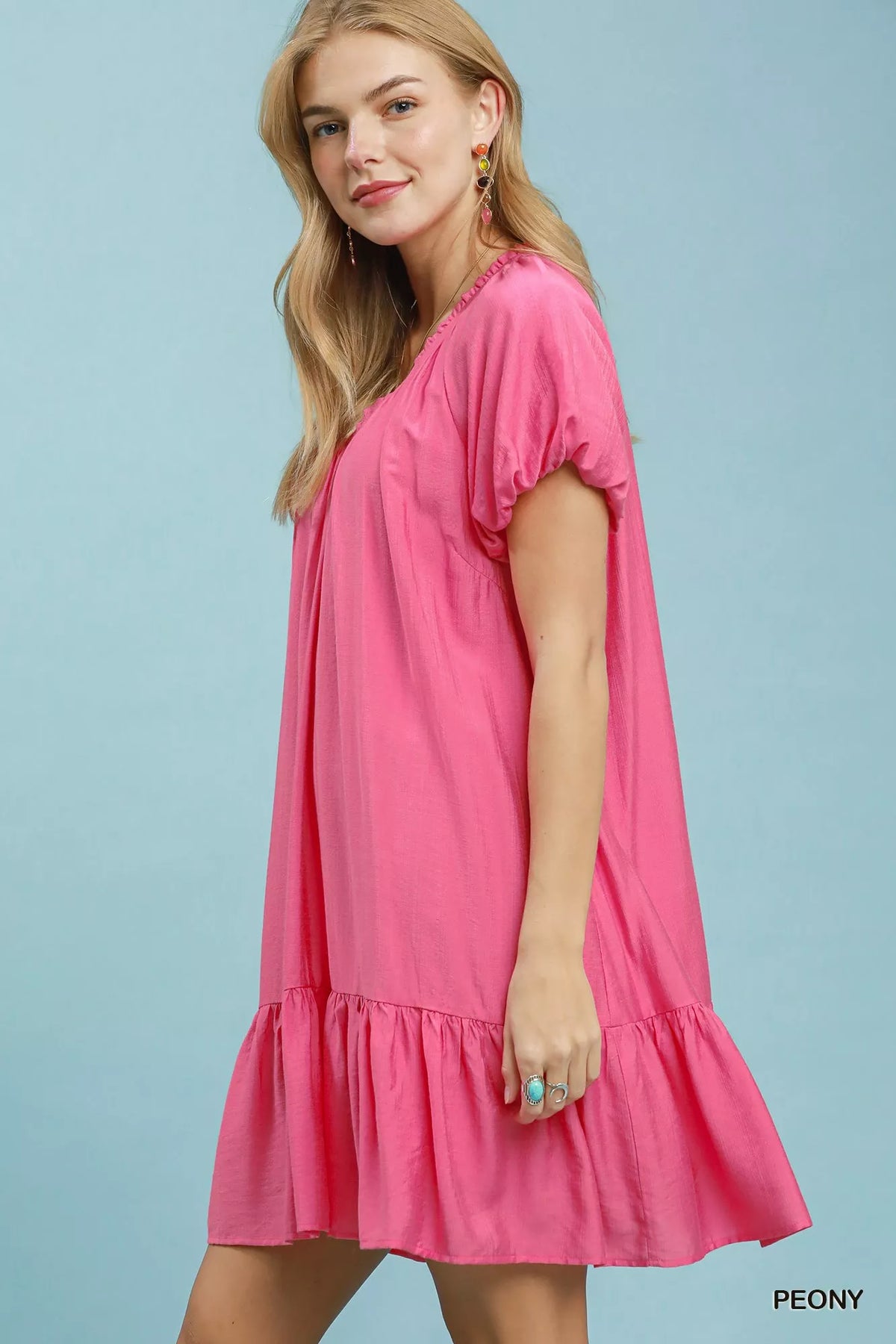 Pink shift mini dress side view
