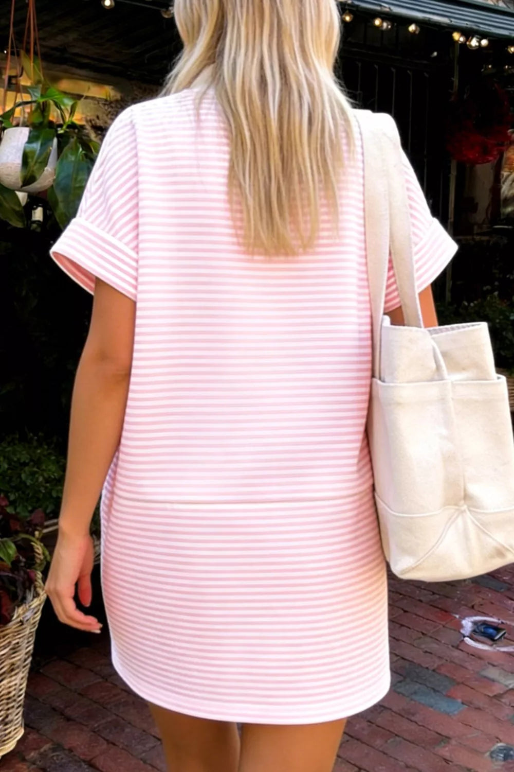 Blush pink striped bow sequin mini dress side view