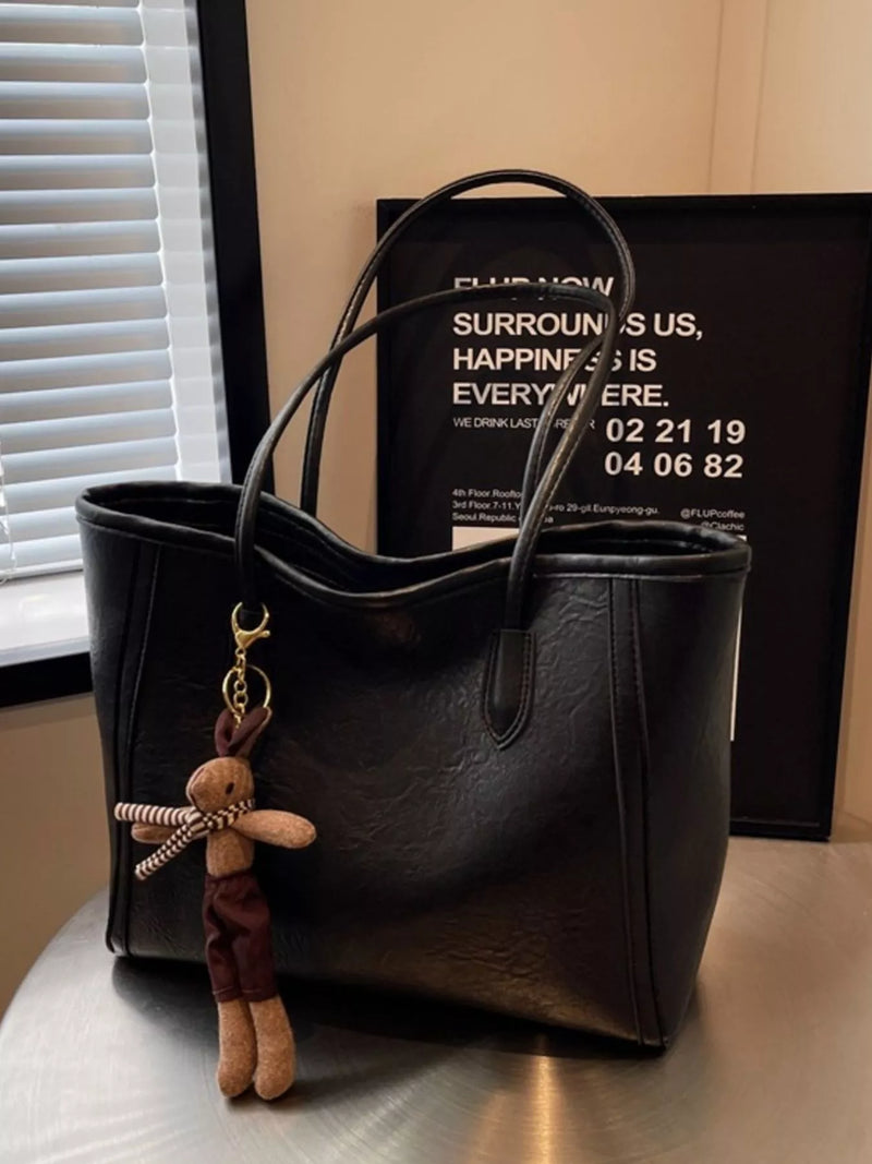 Black leather tote bag front view