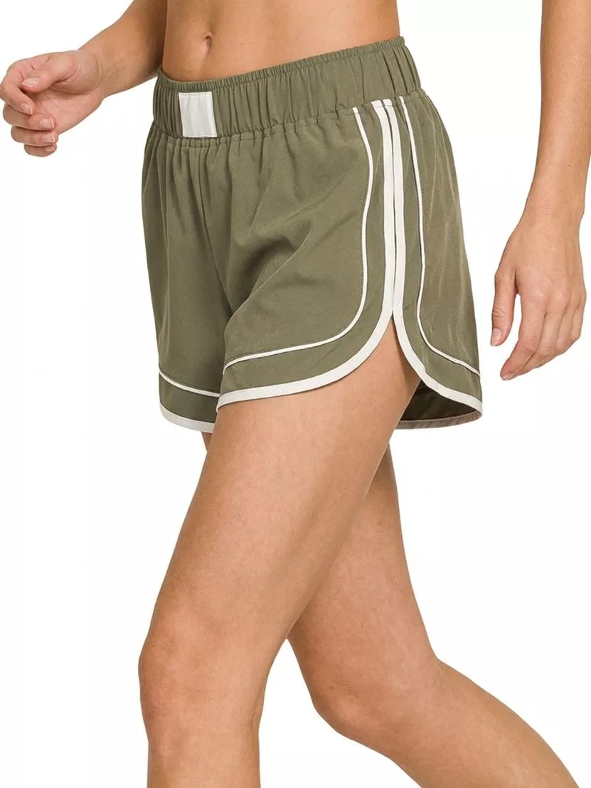 Dusty olive Zenana soft woven dolphin shorts back view
