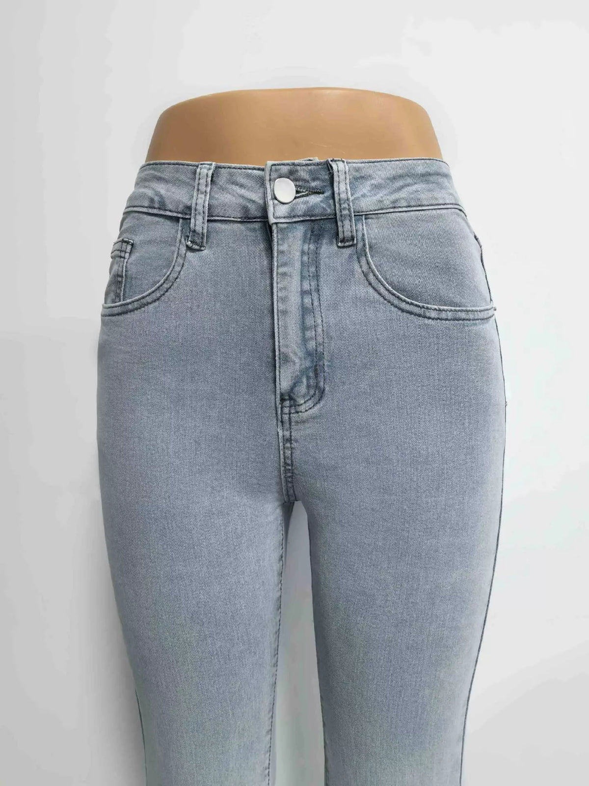 High waist flare jeans styled with heels