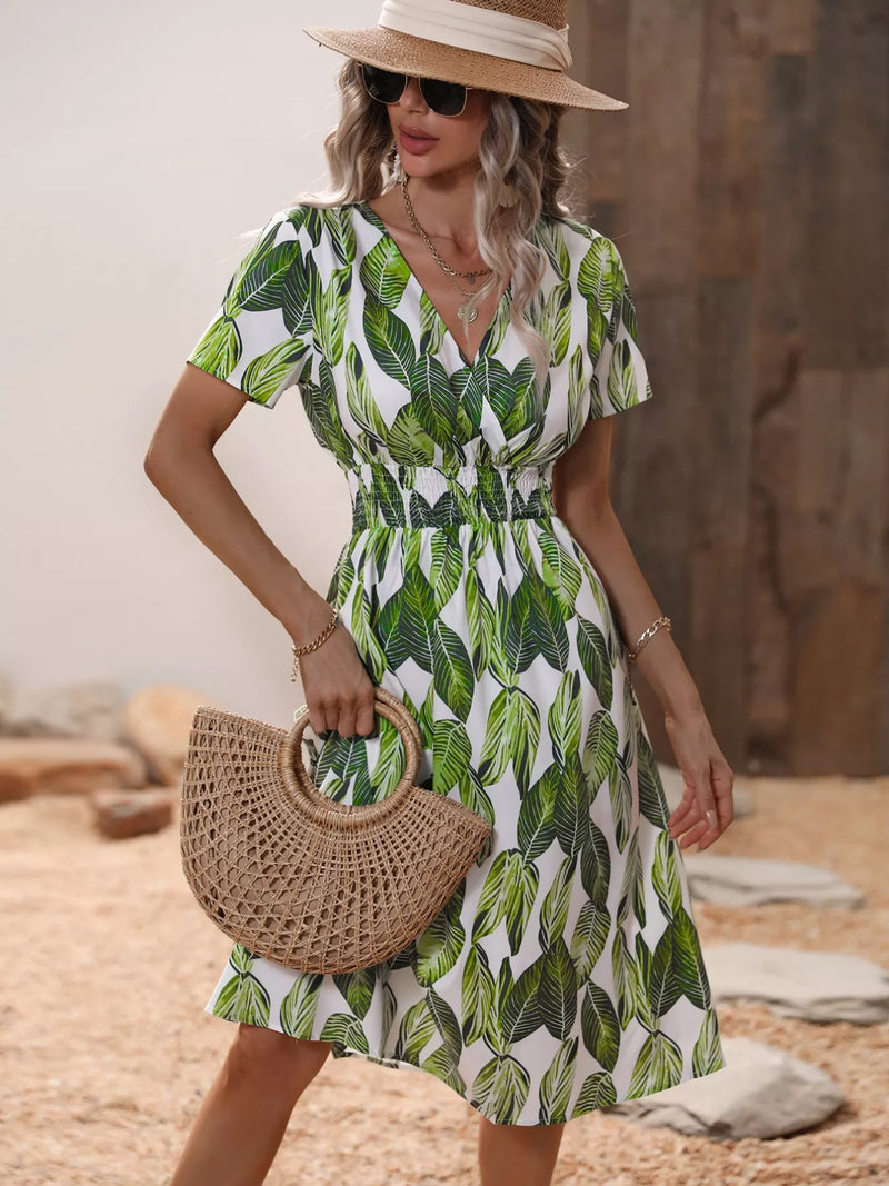 Printed short sleeve smocked midi dress front view