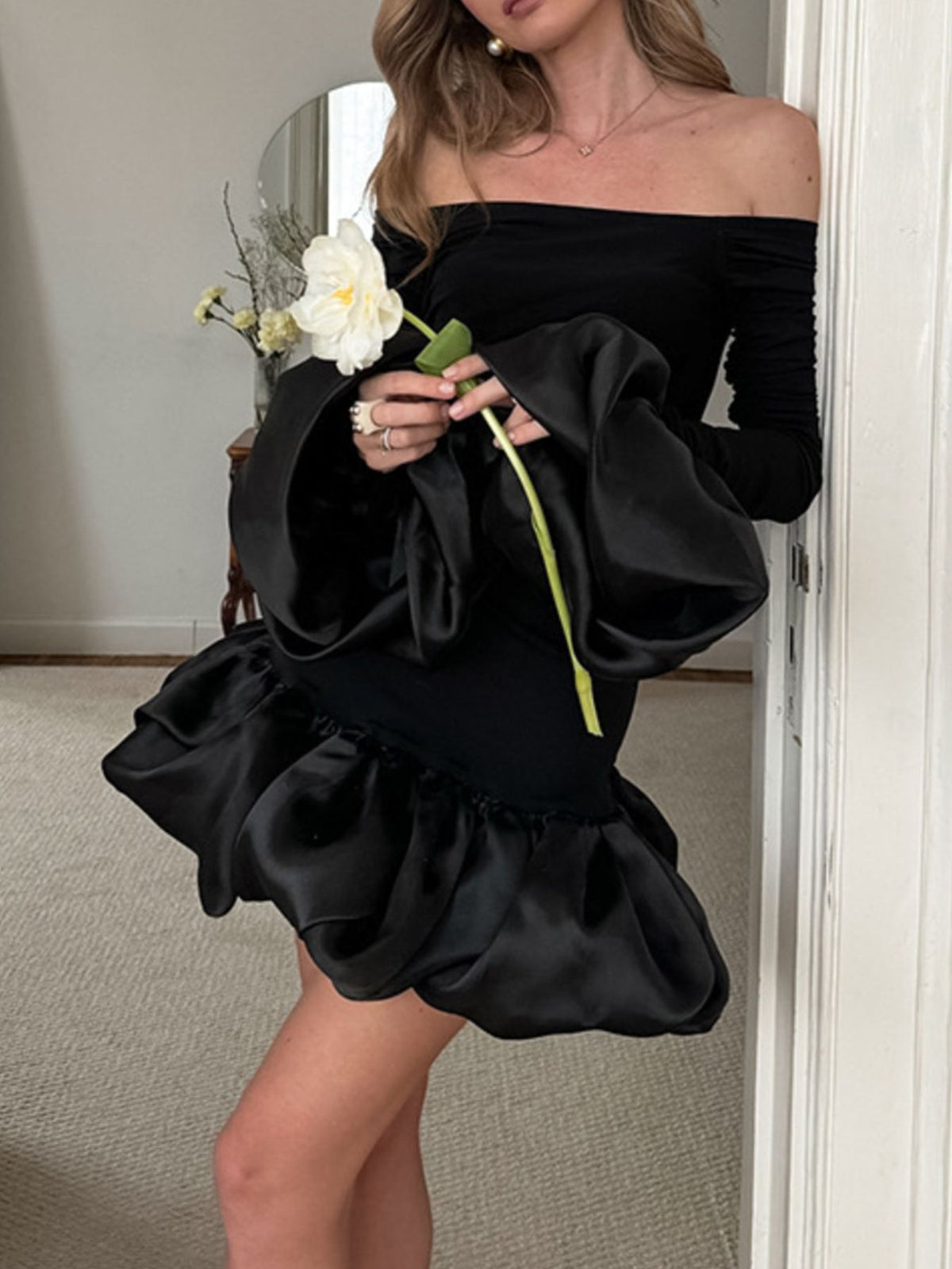 Black off shoulder ruffle hem mini dress full length view