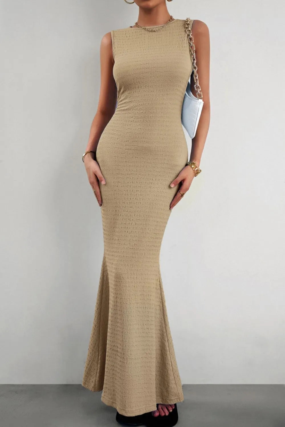 Sleeveless fishtail maxi dress close up
