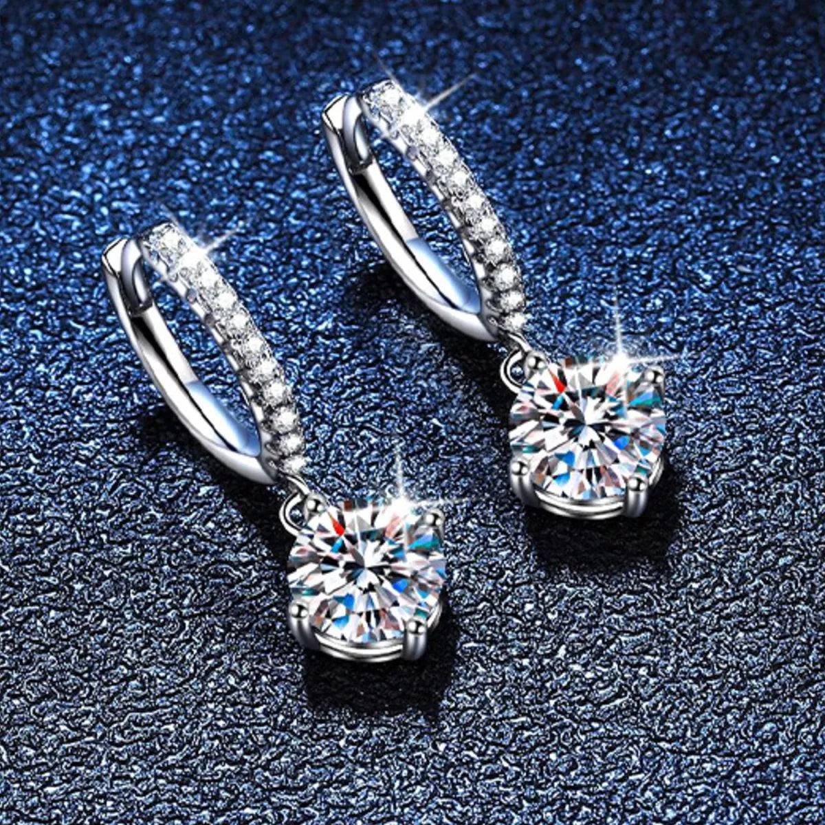Moissanite drop earrings shown as a pair