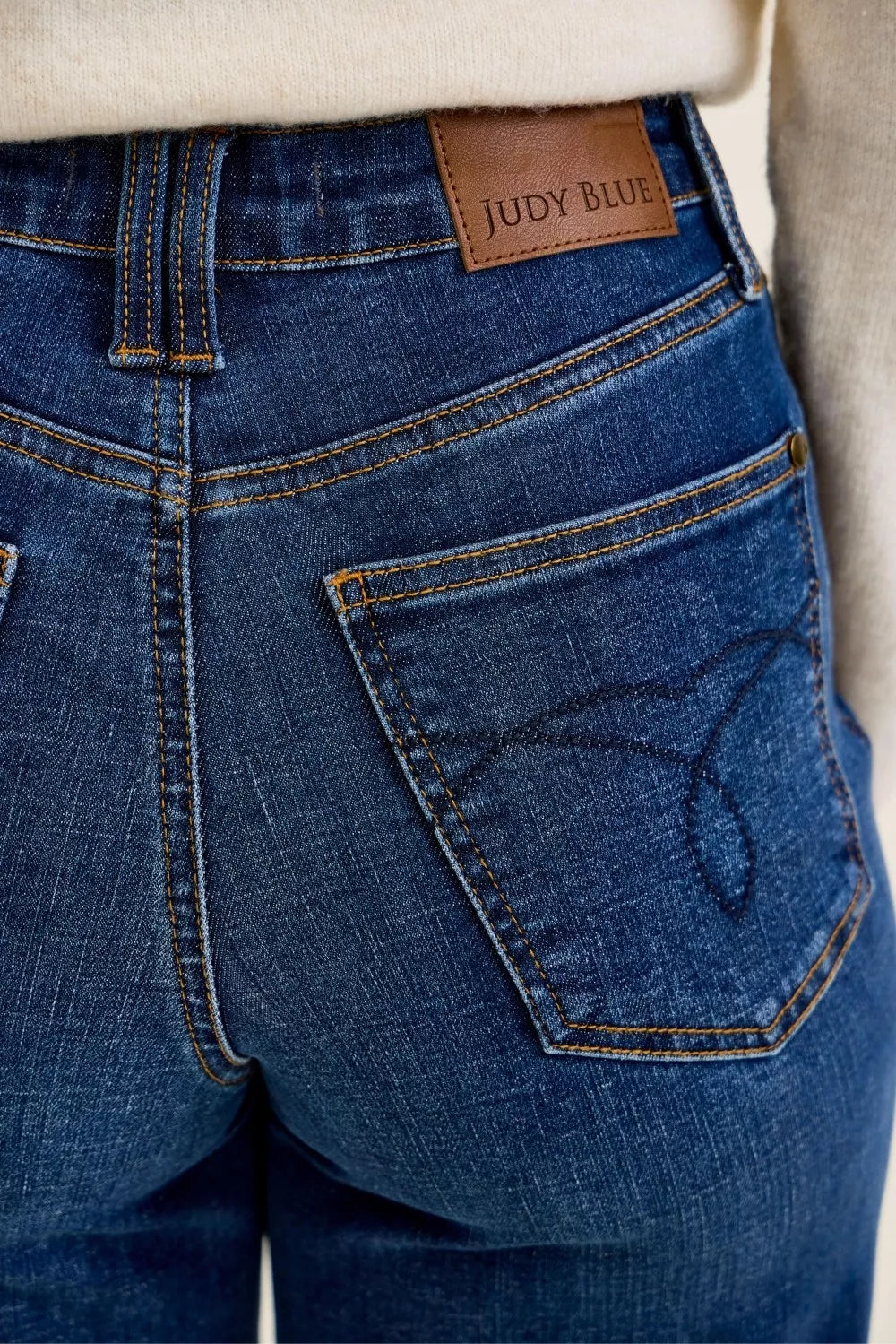 Deep indigo high rise wide leg jeans styled look