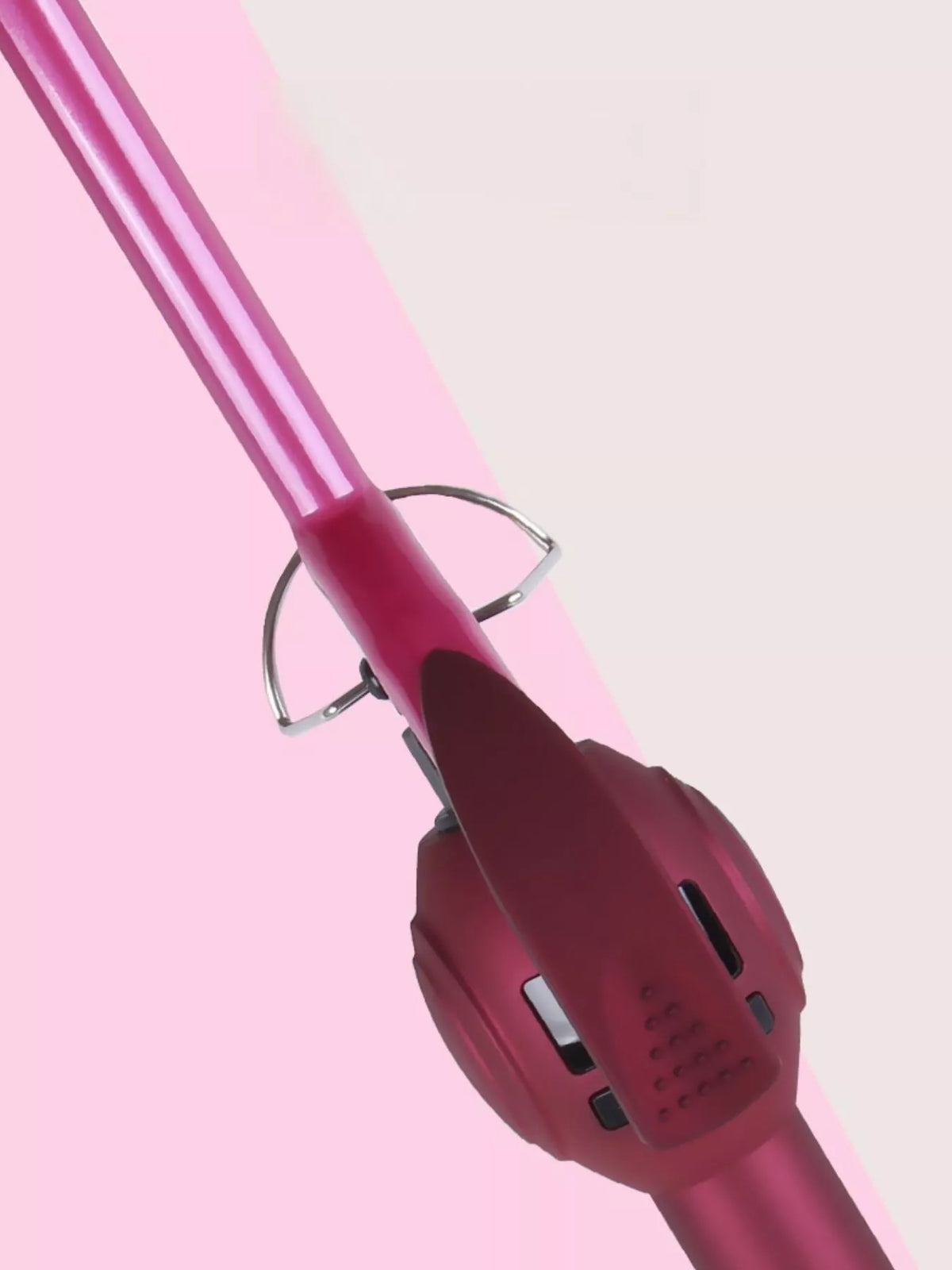 Curling iron side profile in hot pink