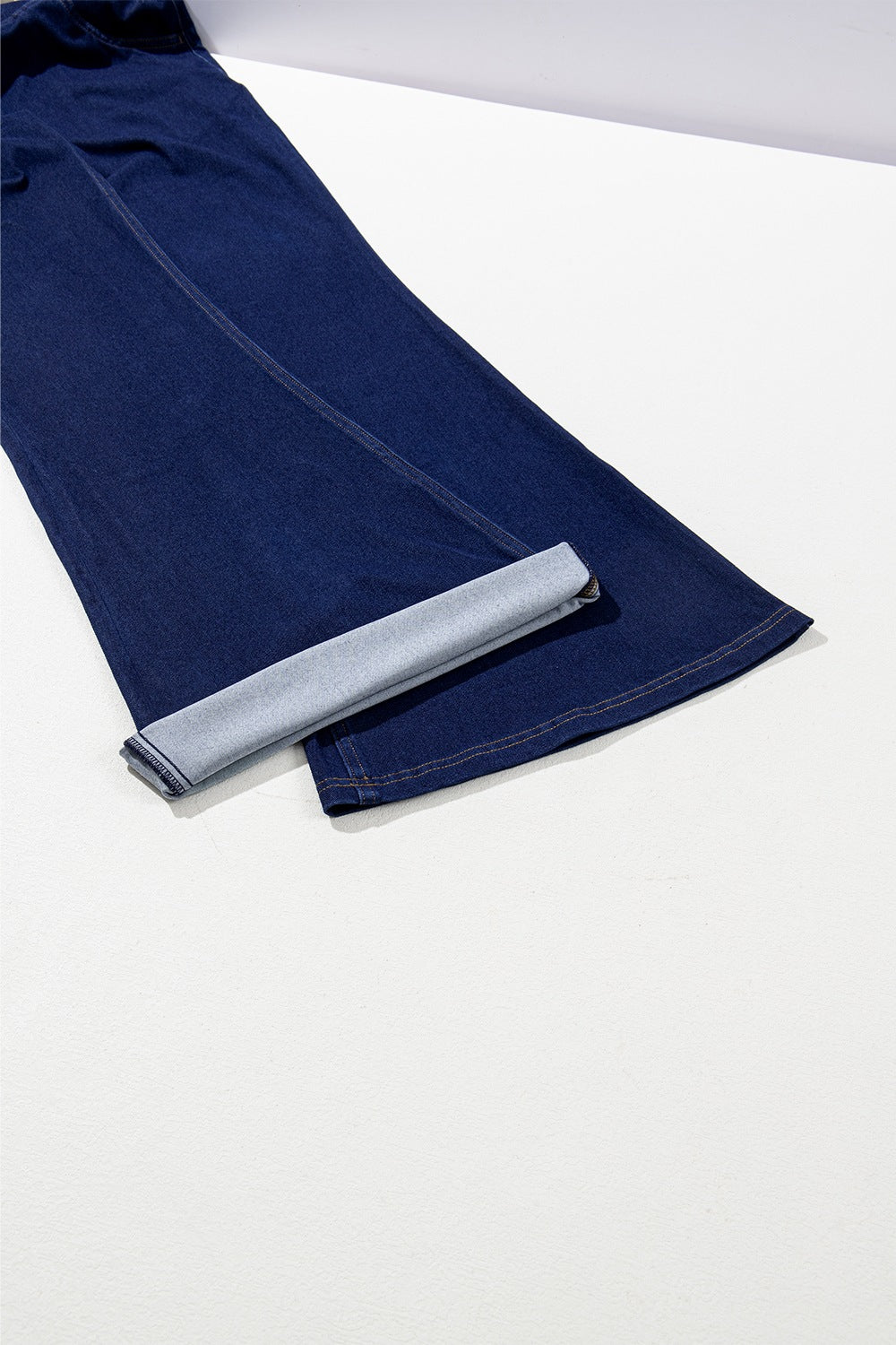 Denim texture close up on flare jeans