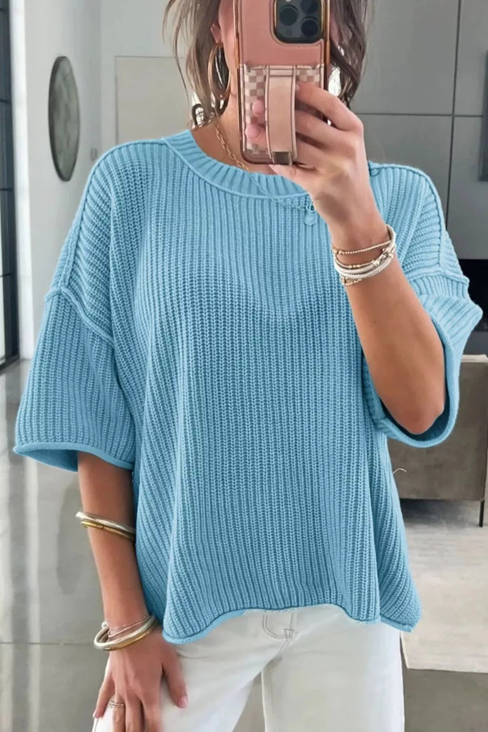 Casual knit half sleeve sweater in pastel blue front view