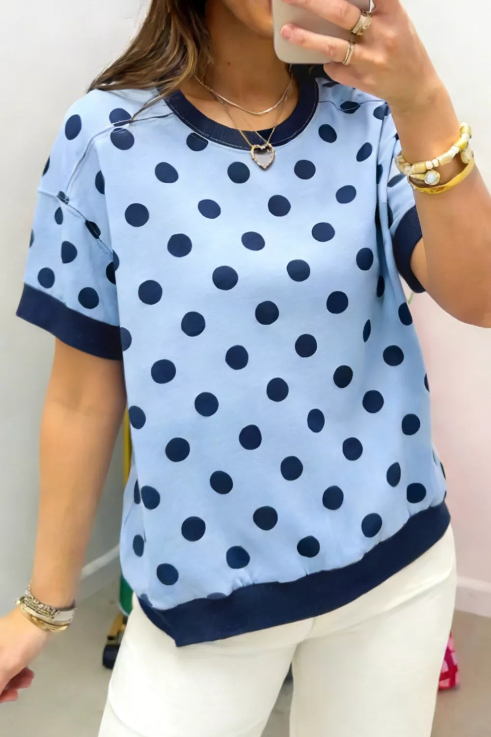 Light blue polka dot round neck knit sweater front
