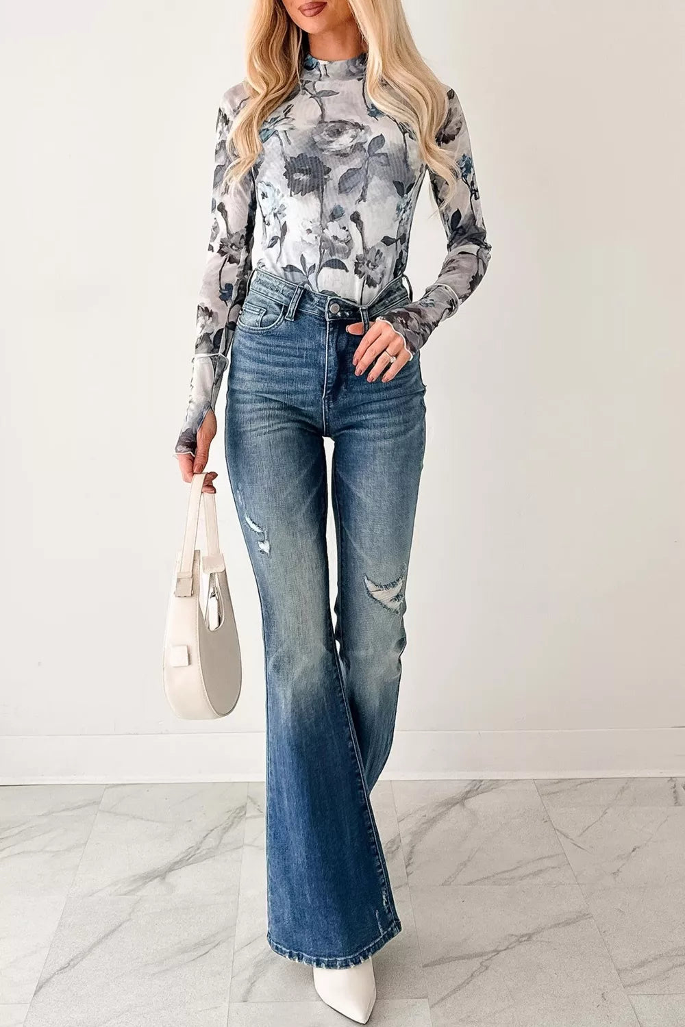 Long sleeve and cuff detail on the mesh layering top