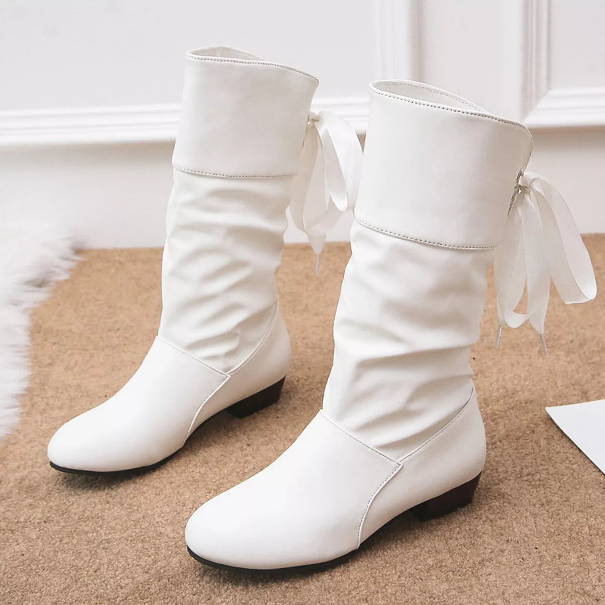 Round toe block heel boots front view