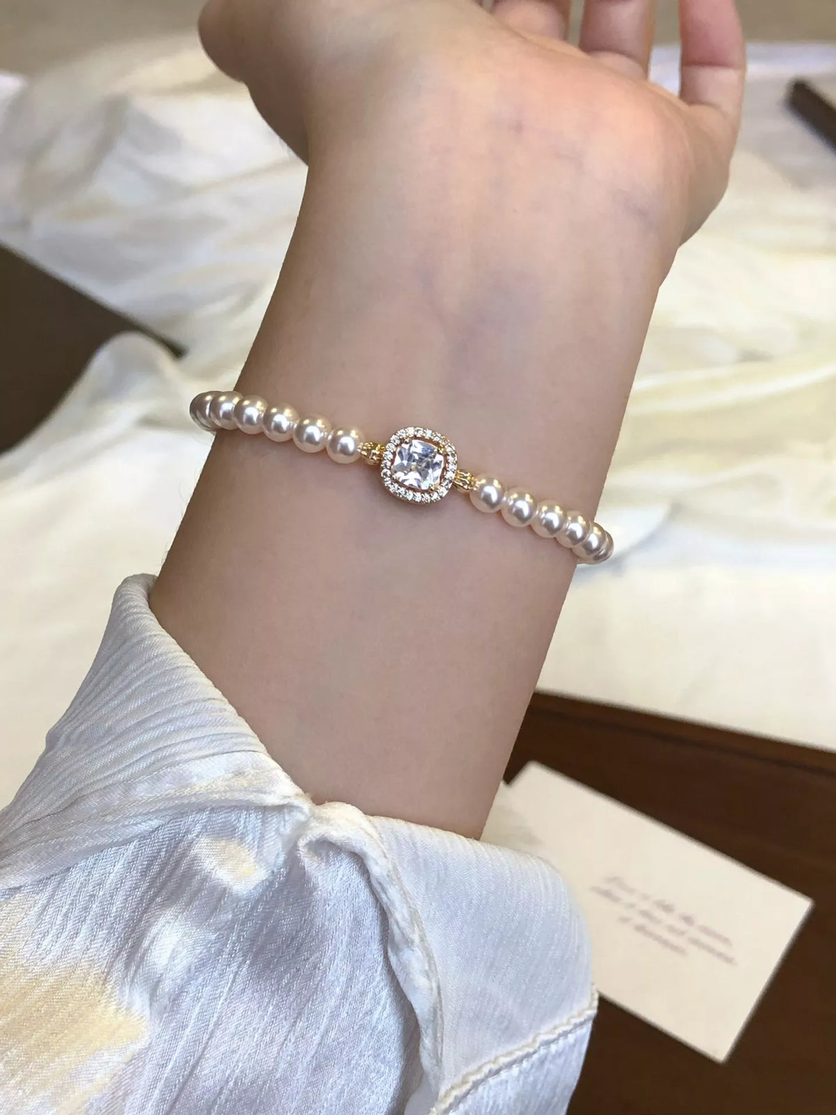 gold plated pearl bracelet styled look