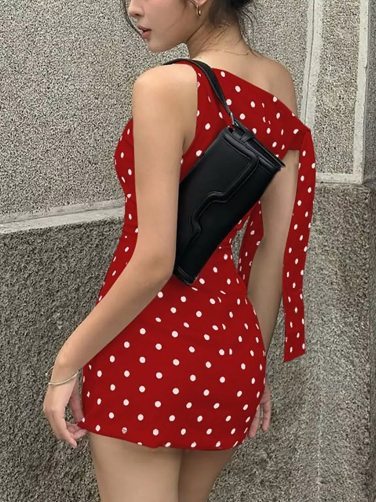 Polka dot mini dress neckline and bow accent, macro detail
