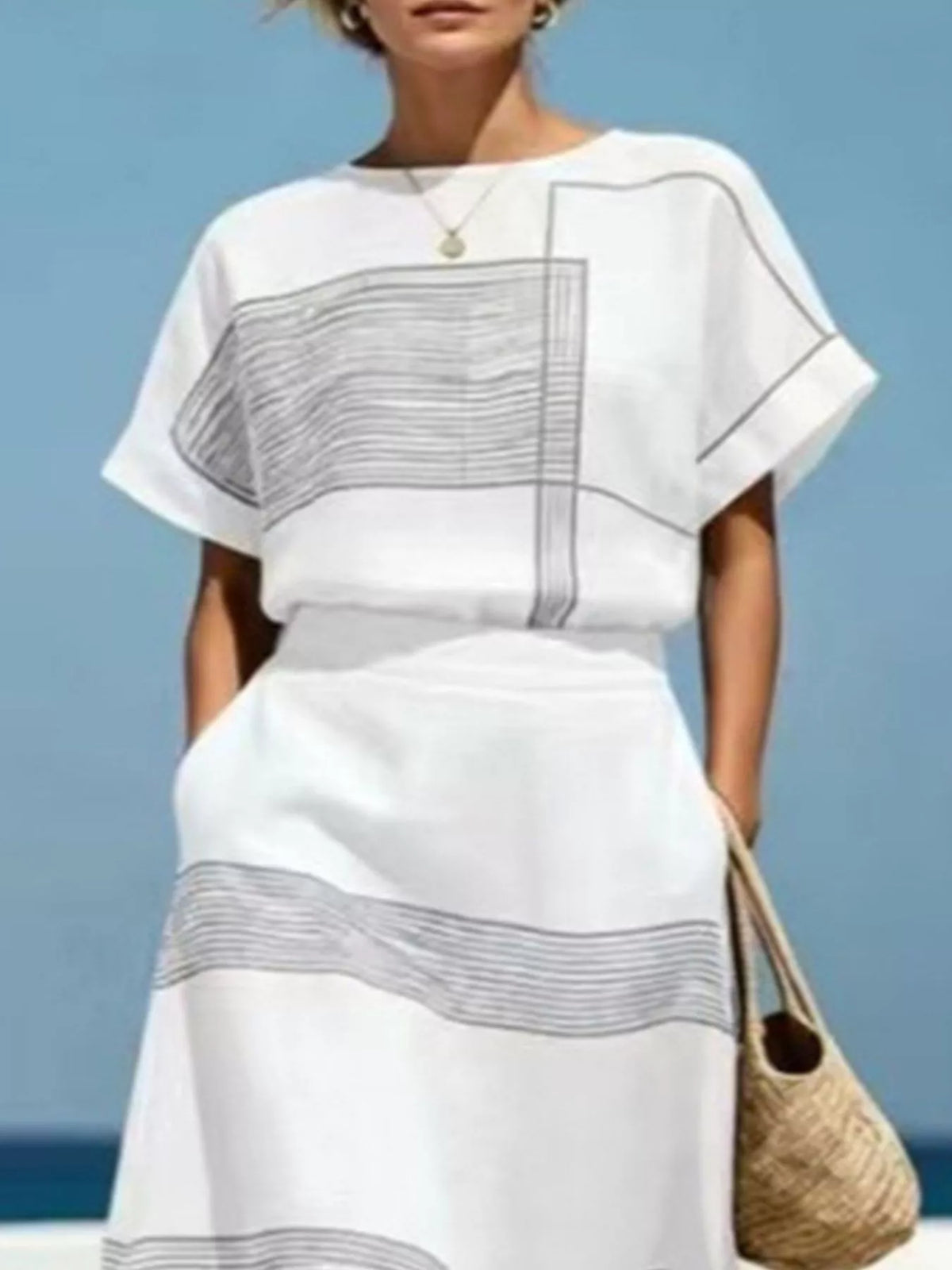 Matching top and skirt set shown from the back