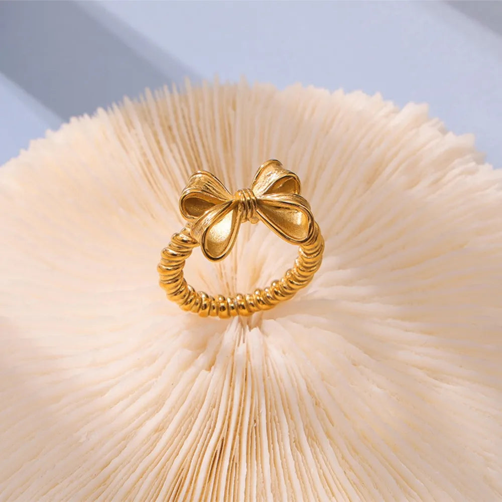 Twisted bow ring shown in gold finish