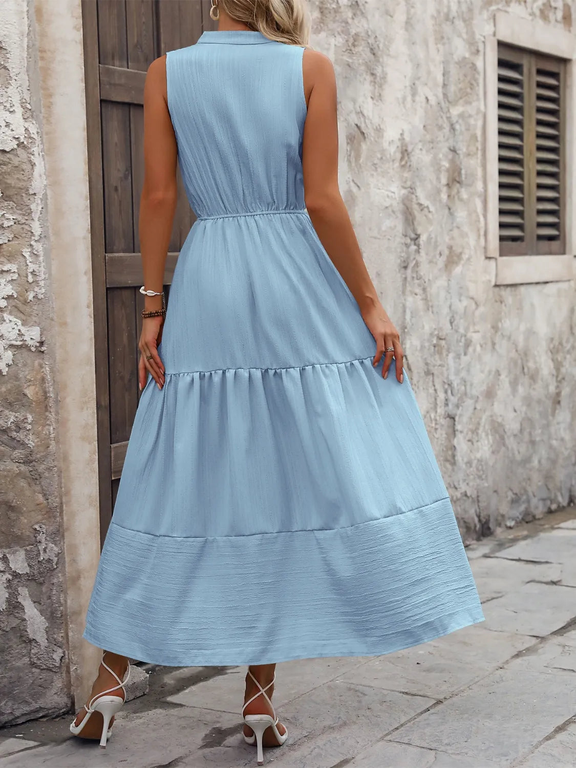 Notched sleeveless maxi tank dress, skirt and hem detail
