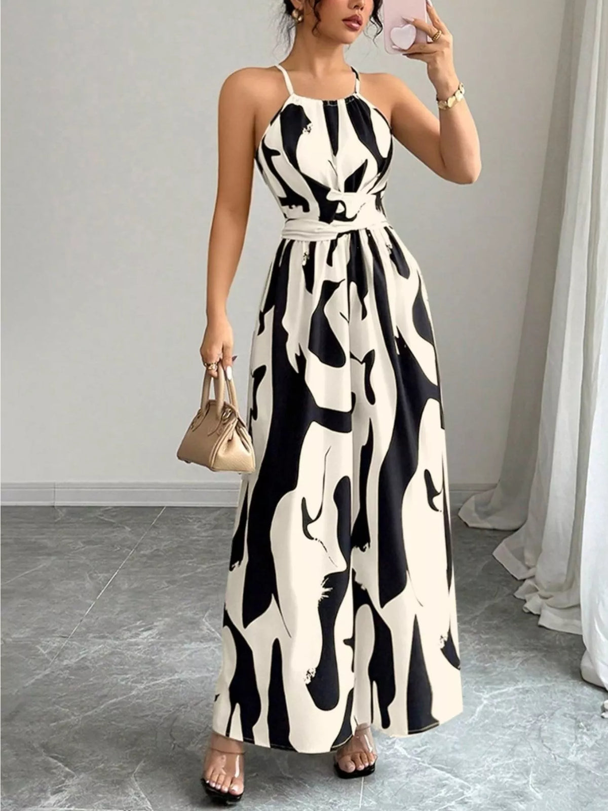 Abstract print halter neck maxi dress styled view