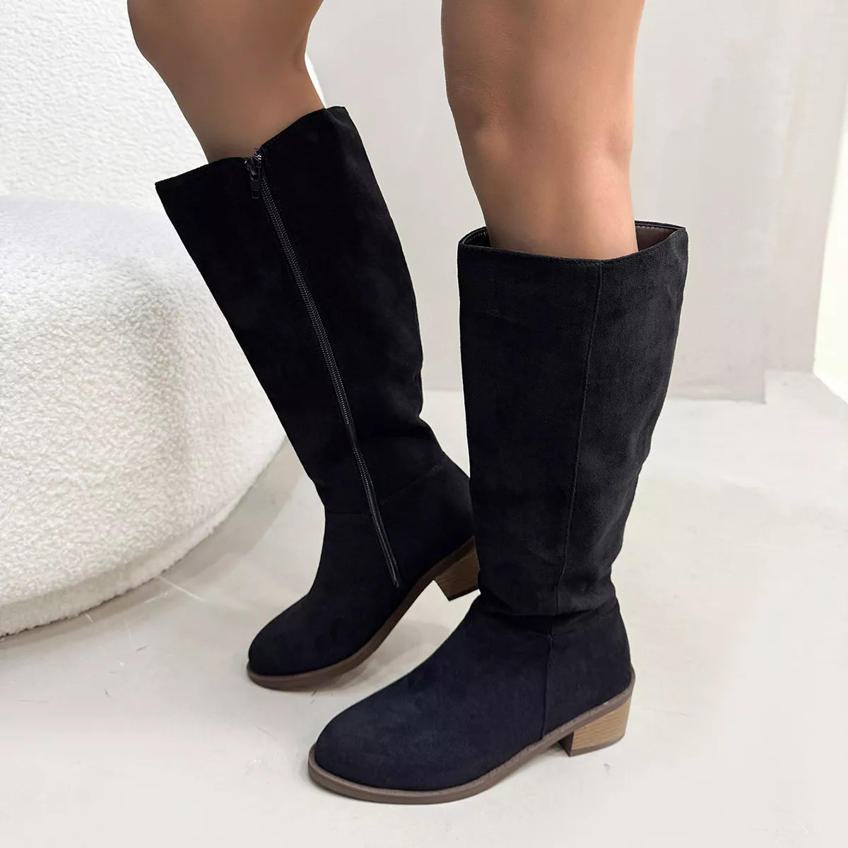Khaki round toe block heels boots angled three quarter view