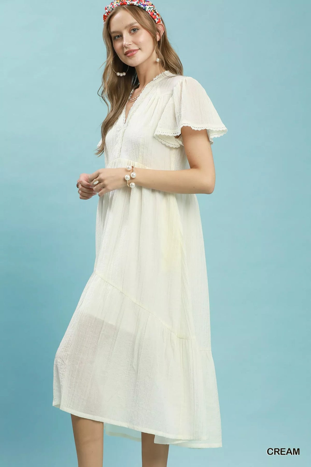Cream textured lace trim tiered midi dress side view