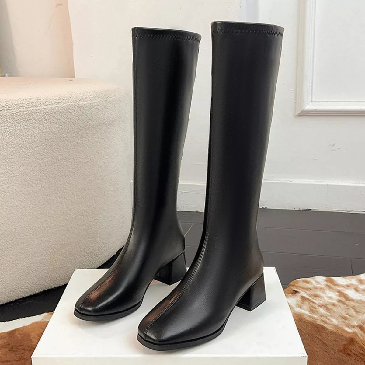 Square toe block heel boots, styled on model