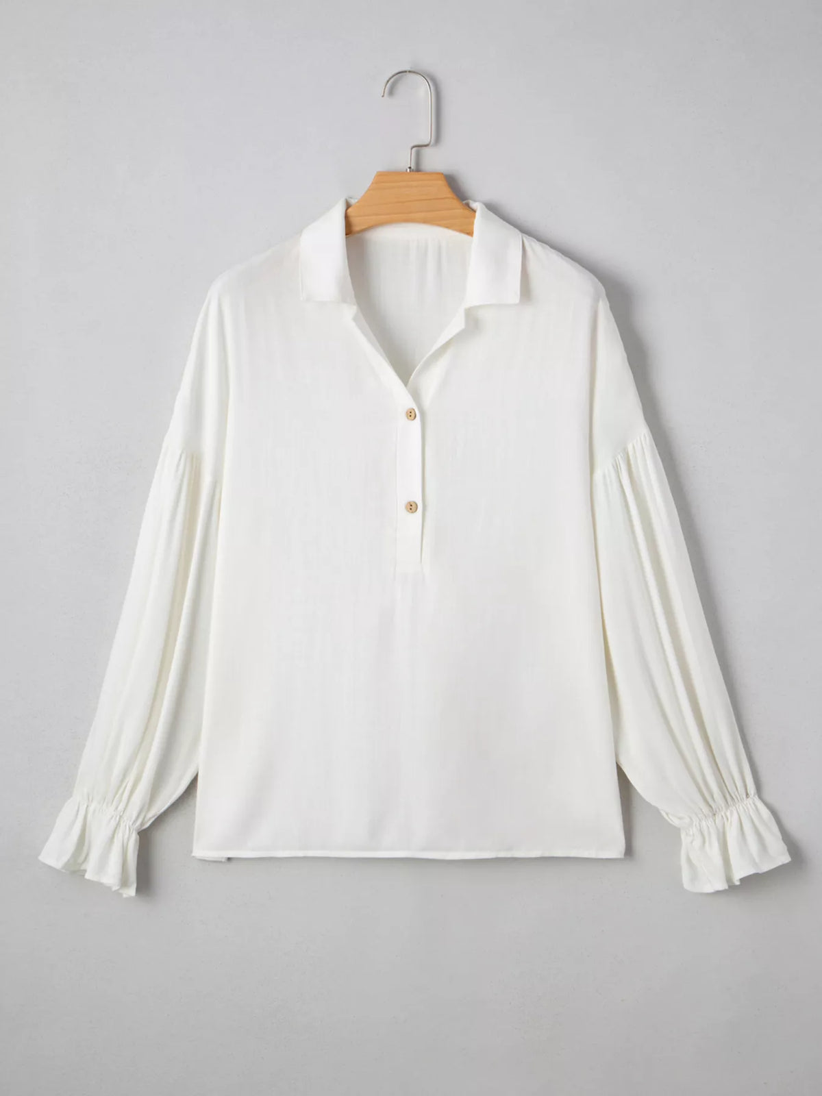 Puffy sleeve blouse three quarter view