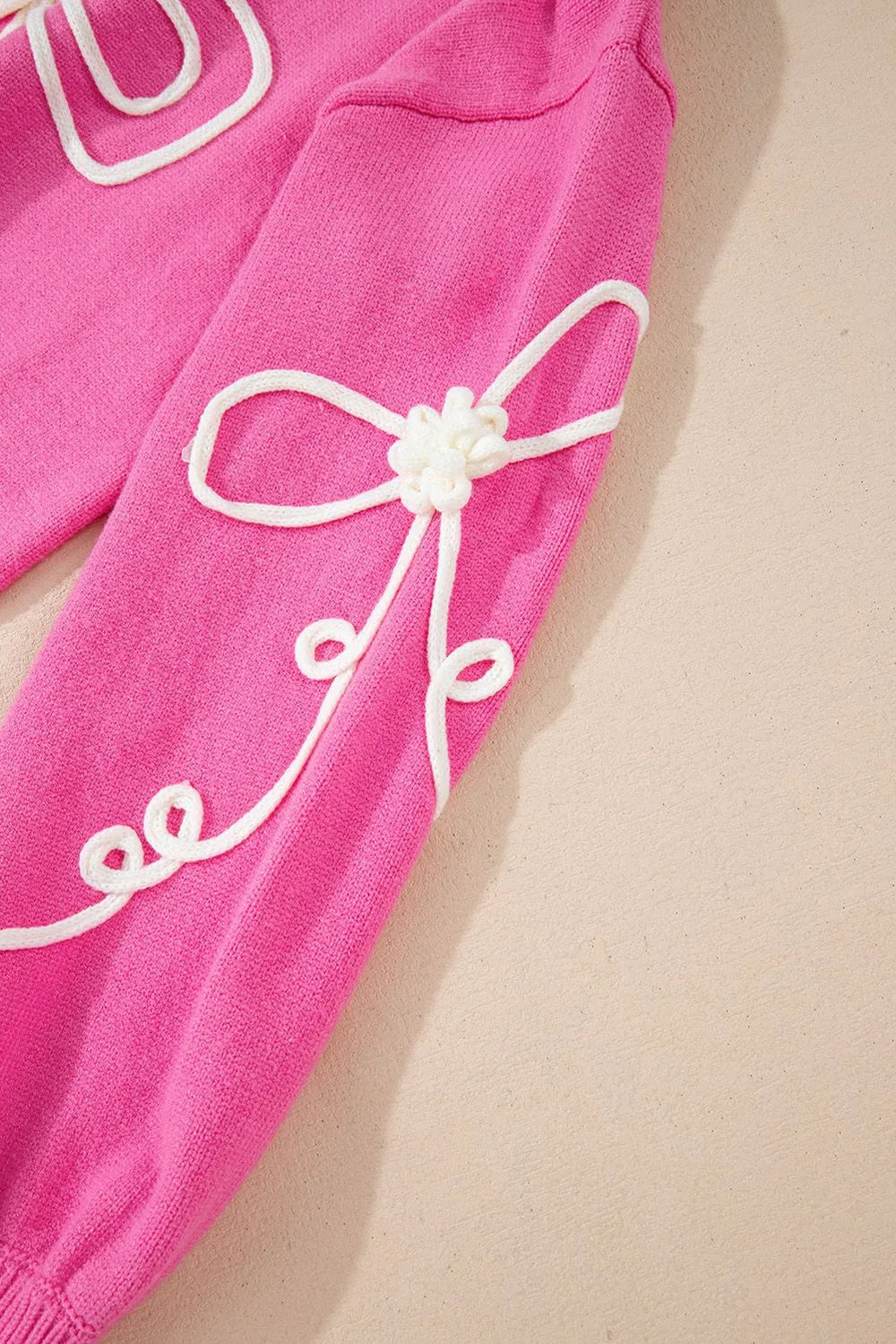 Womens fuchsia bow sweater styled look