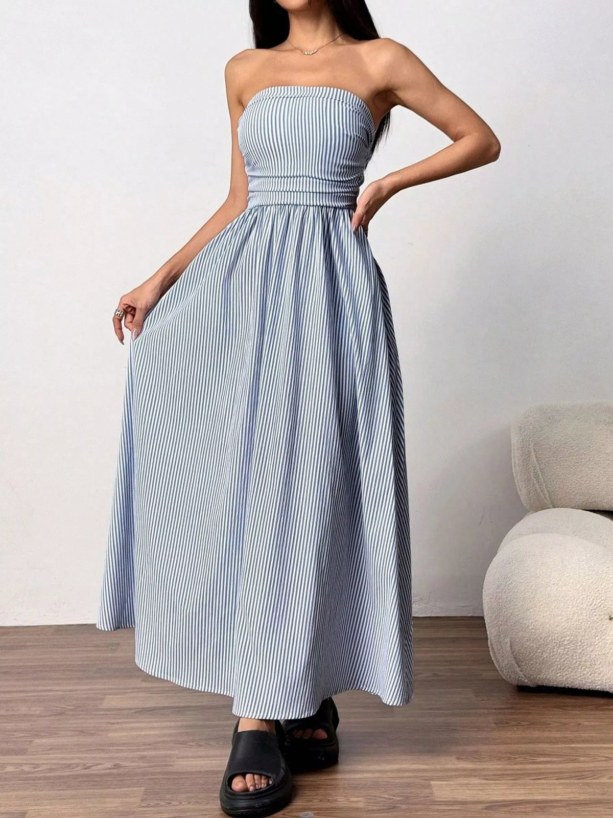 Side view of long strapless summer dress