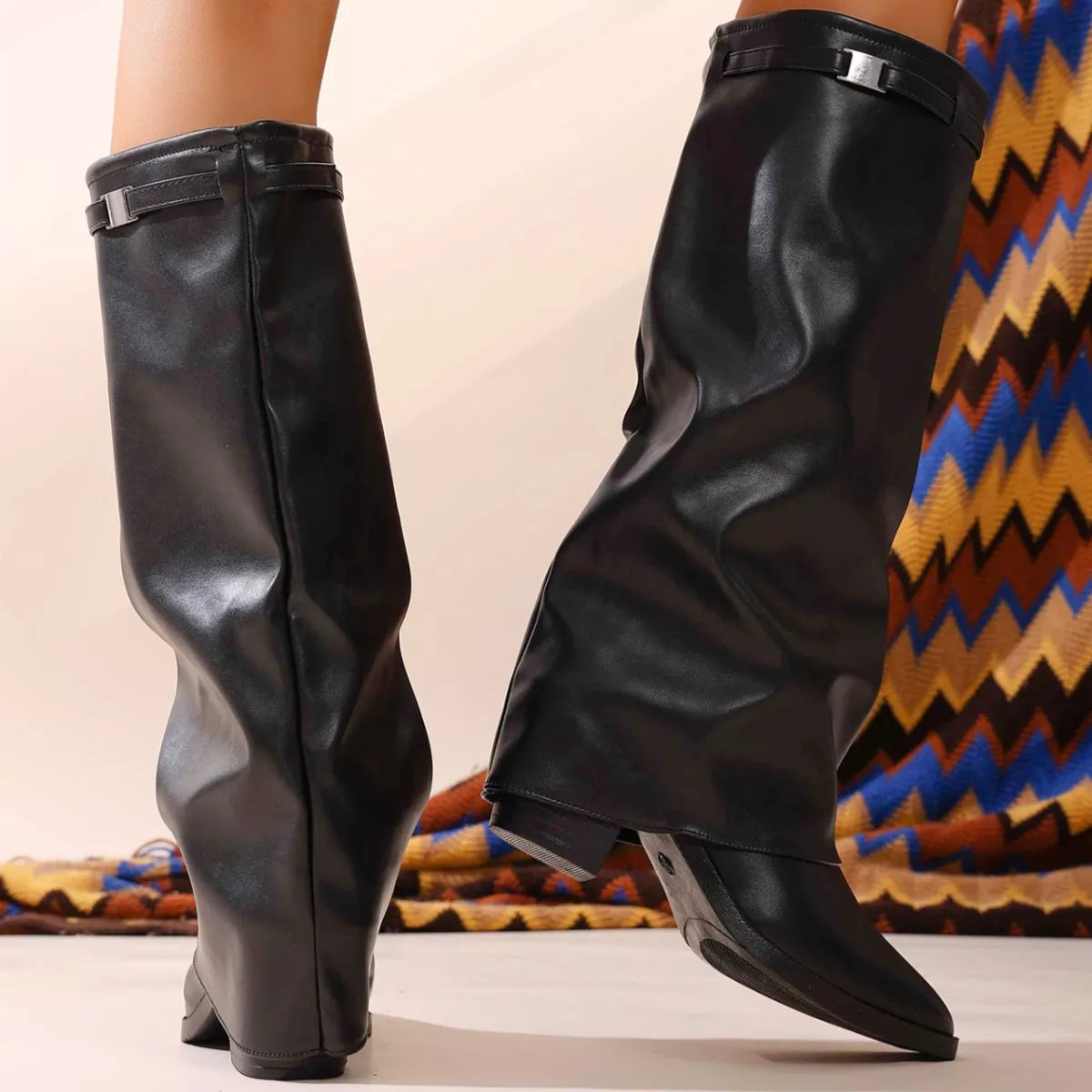 Pointed toe block heel boots styled on model