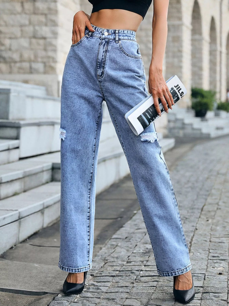 Distressed high waist jeans in blue front view