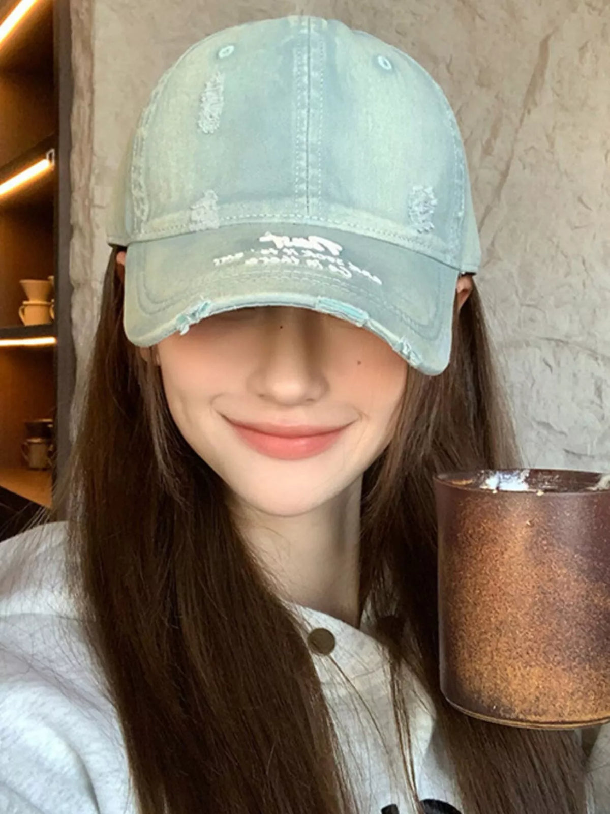 Close up of the embroidery on the cotton cap front panel