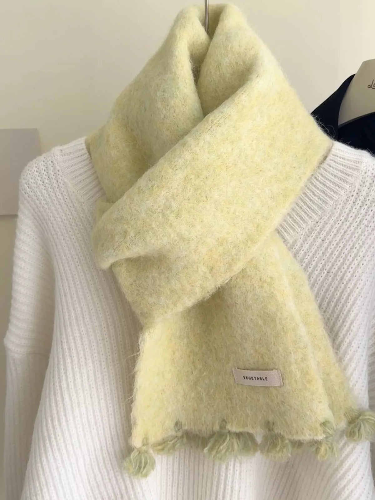 Full length view of the knitted tassel scarf